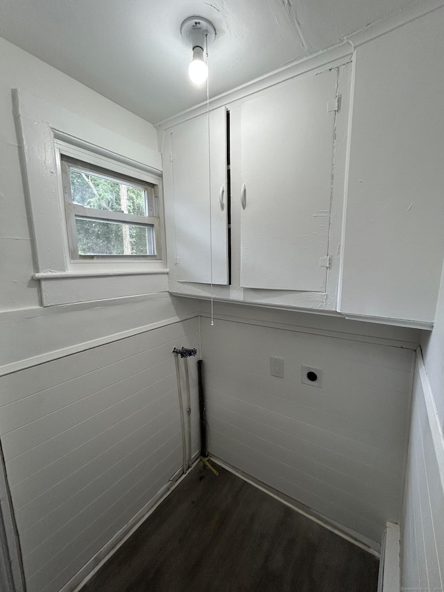 51 Division St, Norwich, CT 06360 - washroom featuring electric dryer hookup, cabinet space, and dark wood-type flooring