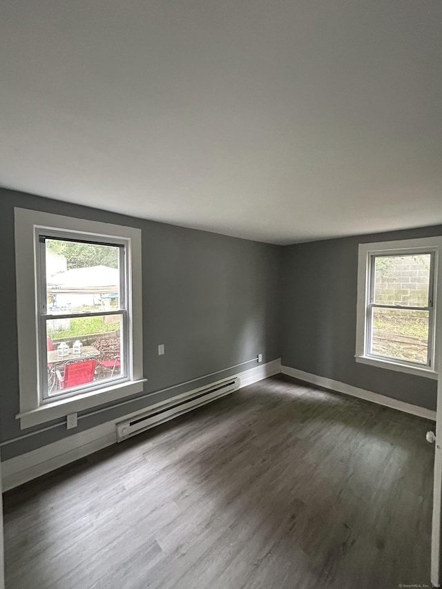 51 Division St, Norwich, CT 06360 - spare room featuring baseboard heating and wood finished floors