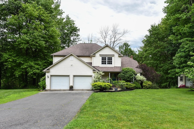 10 Heritage Way, Barkhamsted, CT 06063 - view of front of property featuring asphalt driveway, a front yard, a garage, and a chimney
