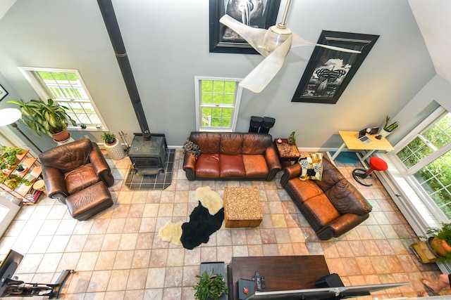 10 Heritage Way, Barkhamsted, CT 06063 - living room featuring a wood stove and a high ceiling