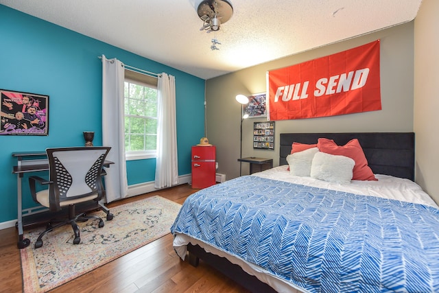 10 Heritage Way, Barkhamsted, CT 06063 - bedroom with wood finished floors and baseboards