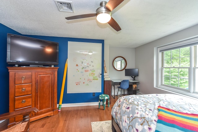 10 Heritage Way, Barkhamsted, CT 06063 - bedroom with wood finished floors and a textured ceiling
