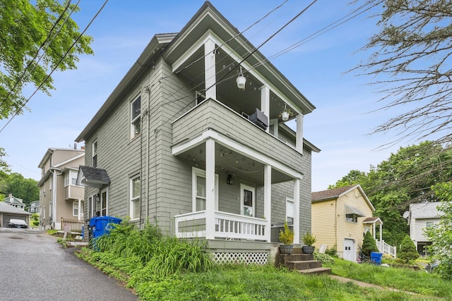 24 Maple St, Torrington, CT 06790 - view of front of property featuring a balcony and covered porch
