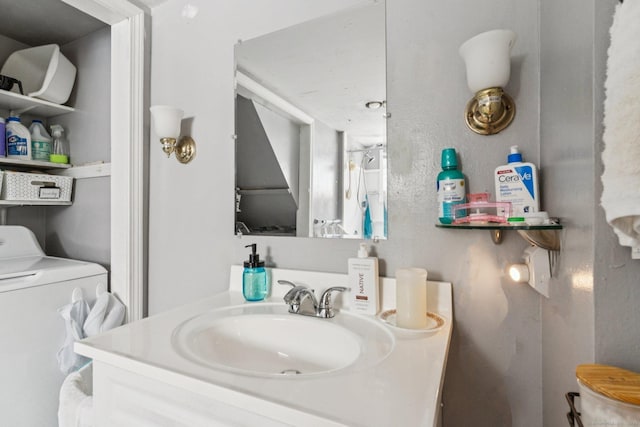 24 Maple St, Torrington, CT 06790 - bathroom featuring washer / dryer and vanity