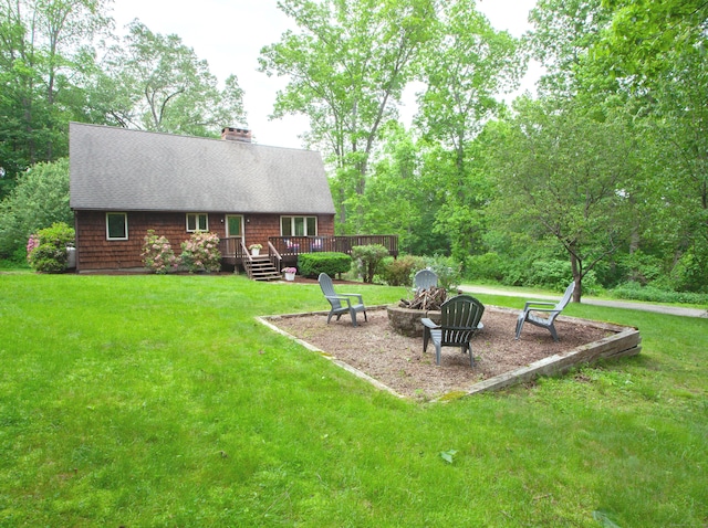 115B Torrington Ave, Canton, CT 06019 - back of house with an outdoor fire pit, a deck, a lawn, and a chimney
