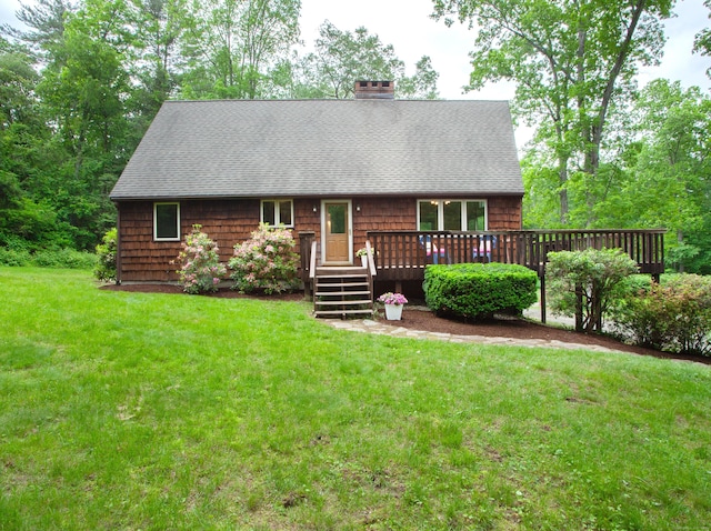 115B Torrington Ave, Canton, CT 06019 - view of front facade with a shingled roof, a wooden deck, and a front lawn