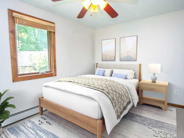 115B Torrington Ave, Canton, CT 06019 - bedroom with a baseboard heating unit, baseboards, and a ceiling fan