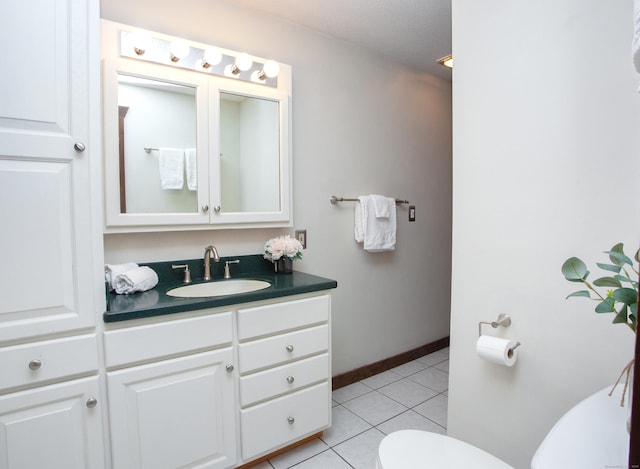115B Torrington Ave, Canton, CT 06019 - bathroom with toilet, vanity, tile patterned flooring, and baseboards