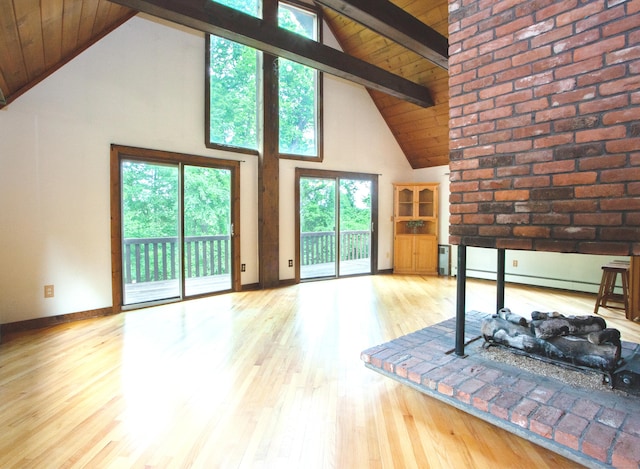 115B Torrington Ave, Canton, CT 06019 - unfurnished living room with high vaulted ceiling, wood finished floors, wooden ceiling with exposed beams, baseboards, and a baseboard radiator