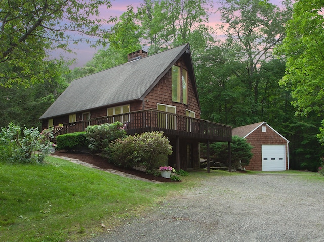 115B Torrington Ave, Canton, CT 06019 - view of front of property featuring a garage, an outdoor structure, a deck, a shingled roof, and a chimney