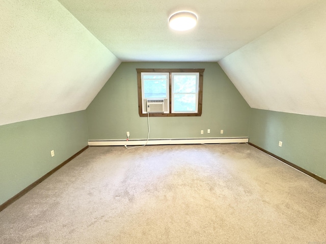 115B Torrington Ave, Canton, CT 06019 - additional living space featuring vaulted ceiling, carpet floors, baseboards, and a baseboard heating unit