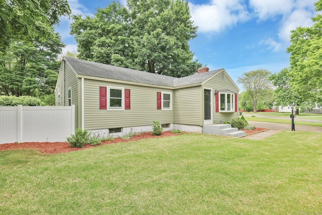 21 Enfield St, Windsor Locks, CT 06096 - view of front facade featuring a chimney and a shingled roof