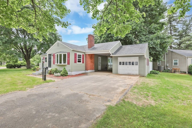 21 Enfield St, Windsor Locks, CT 06096 - single story home featuring a garage, a chimney, driveway, central AC, and a front lawn