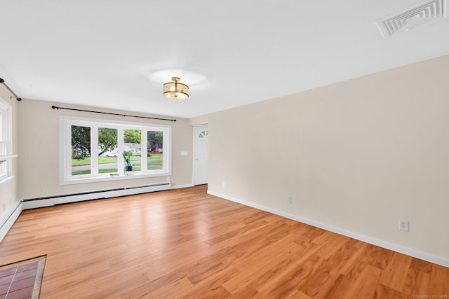 21 Enfield St, Windsor Locks, CT 06096 - unfurnished room with light wood-style flooring and baseboards