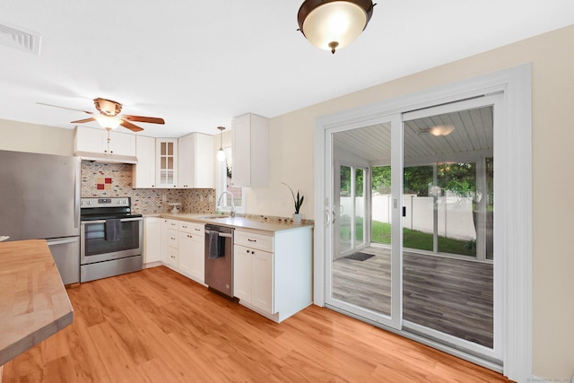 21 Enfield St, Windsor Locks, CT 06096 - kitchen with appliances with stainless steel finishes, a sink, light wood-style floors, white cabinetry, and ceiling fan