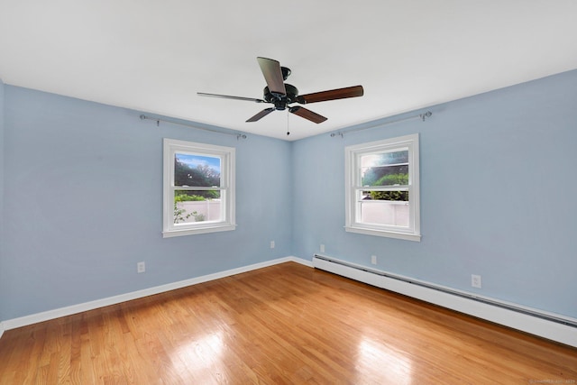 21 Enfield St, Windsor Locks, CT 06096 - unfurnished room featuring a baseboard radiator, wood finished floors, baseboards, and a ceiling fan