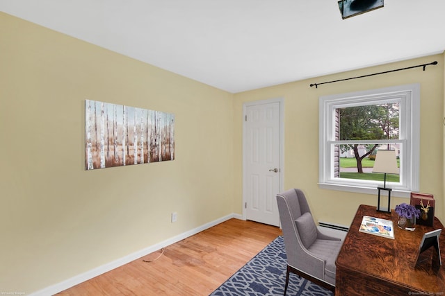21 Enfield St, Windsor Locks, CT 06096 - office space with wood finished floors, baseboards, and a baseboard heating unit
