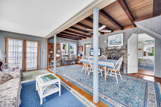7 Meriden Ave, Westbrook, CT 06498 - dining area featuring wood walls, plenty of natural light, wood finished floors, and wood ceiling with exposed beams