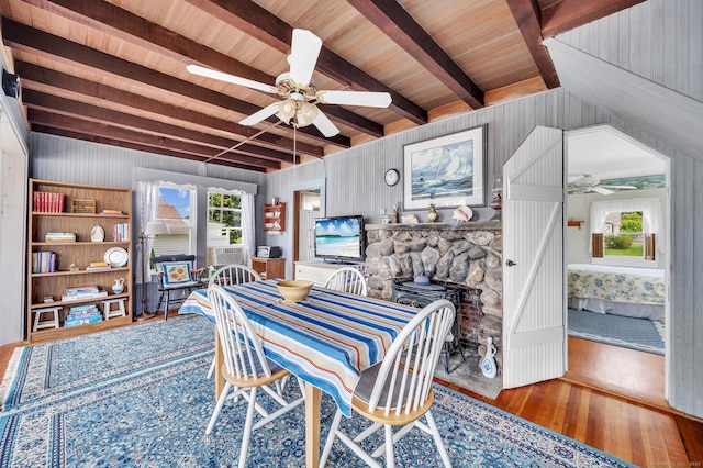 7 Meriden Ave, Westbrook, CT 06498 - dining area with ceiling fan, hardwood / wood-style flooring, beam ceiling, and wooden walls
