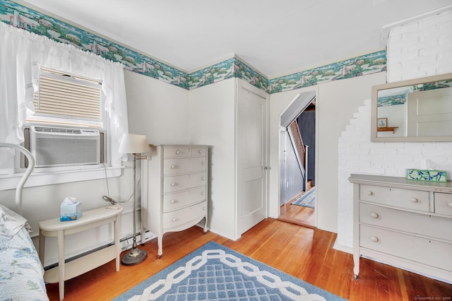 7 Meriden Ave, Westbrook, CT 06498 - bedroom with light wood-style floors, cooling unit, and a baseboard radiator