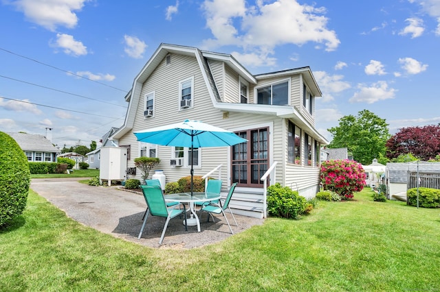 7 Meriden Ave, Westbrook, CT 06498 - back of property featuring a lawn, a patio, entry steps, and a gambrel roof
