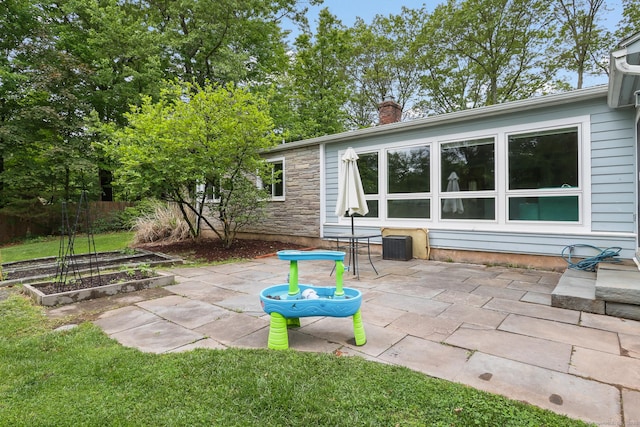 1704 Hill St, Suffield, CT 06078 - view of patio with a garden