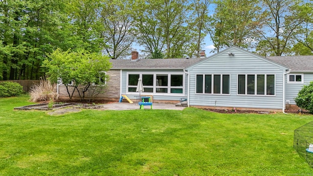 1704 Hill St, Suffield, CT 06078 - back of house featuring a chimney, roof with shingles, and a patio area