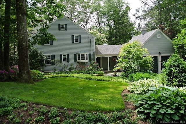 175 Tokeneke Dr, North Haven, CT 06473 - rear view of house featuring a yard