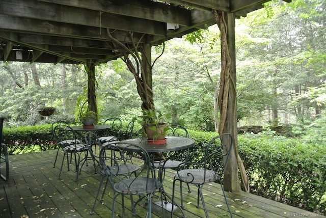 175 Tokeneke Dr, North Haven, CT 06473 - wooden deck featuring outdoor dining space and a forest view
