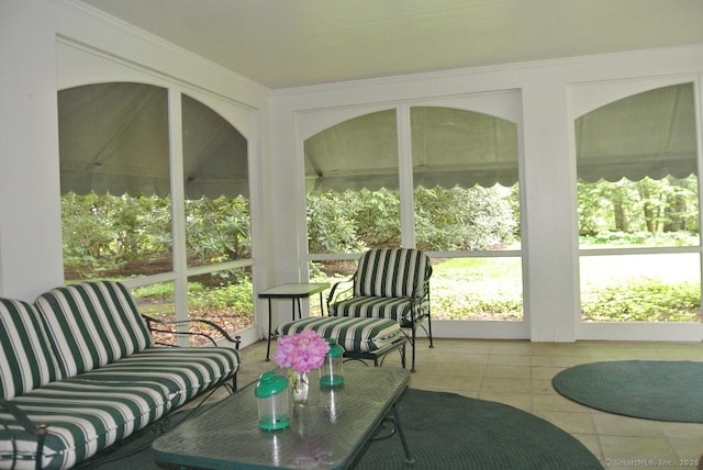 175 Tokeneke Dr, North Haven, CT 06473 - sunroom / solarium featuring tile patterned floors, an outdoor living space, and crown molding