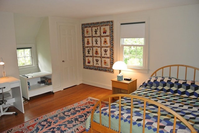 175 Tokeneke Dr, North Haven, CT 06473 - bedroom with wood finished floors and an office area