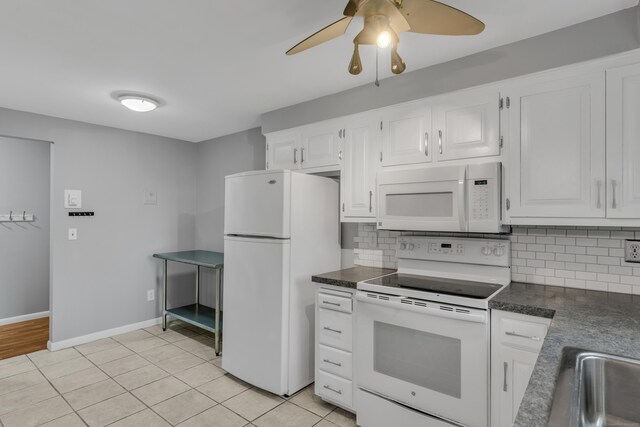 19 Harbour Vlg Unit B, Branford, CT 06405 - kitchen with white appliances, tasteful backsplash, dark countertops, and a ceiling fan