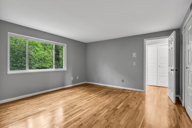 19 Harbour Vlg Unit B, Branford, CT 06405 - empty room with light wood-type flooring and baseboards