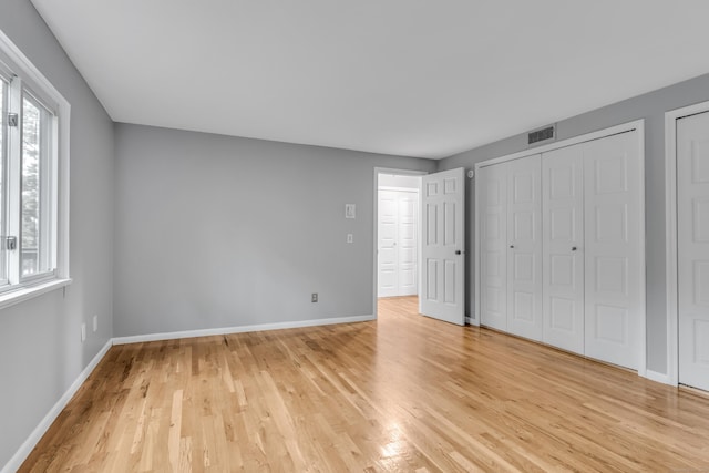 19 Harbour Vlg Unit B, Branford, CT 06405 - unfurnished bedroom with light wood-style floors and baseboards