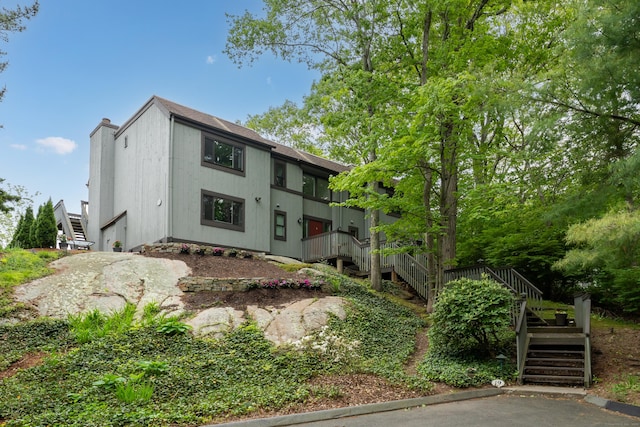 19 Harbour Vlg Unit B, Branford, CT 06405 - multi unit property with stairs, a shingled roof, and a chimney