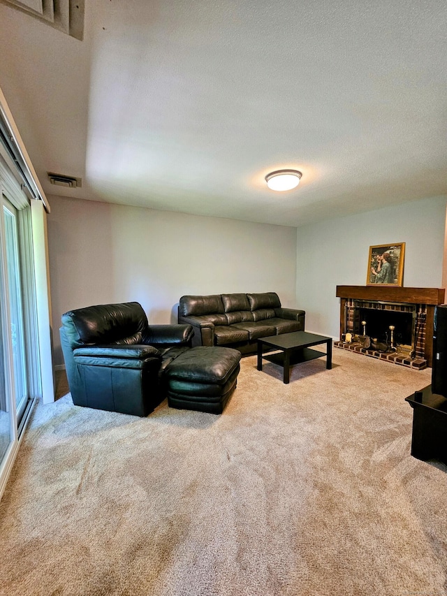42 Village Rd Unit 42, Southington, CT 06489 - carpeted living area with a brick fireplace