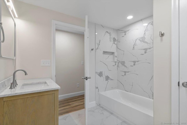 121 Lurton St, New Britain, CT 06053 - full bath with marble look tile flooring, vanity, bathtub / shower combination, recessed lighting, and baseboards