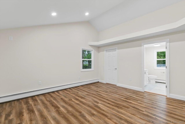 121 Lurton St, New Britain, CT 06053 - unfurnished bedroom with a baseboard radiator, wood finished floors, vaulted ceiling, multiple windows, and recessed lighting
