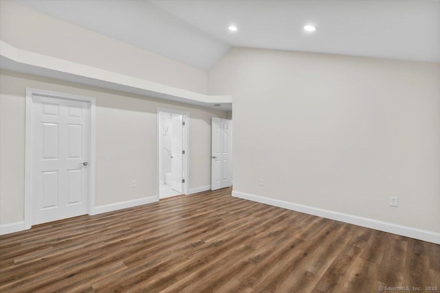 121 Lurton St, New Britain, CT 06053 - unfurnished bedroom with dark wood-type flooring, lofted ceiling, baseboards, recessed lighting, and connected bathroom