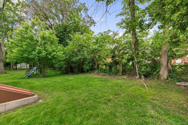 121 Lurton St, New Britain, CT 06053 - view of green lawn with a playground