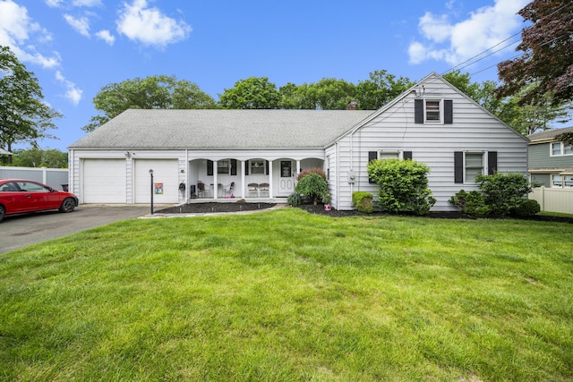 327 Steele St, New Britain, CT 06052 - view of front of house featuring a garage, covered porch, driveway, a chimney, and roof with shingles