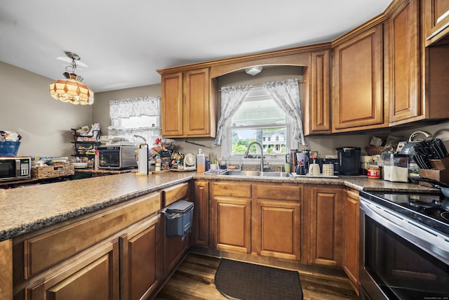 327 Steele St, New Britain, CT 06052 - kitchen with a sink, stainless steel electric range oven, plenty of natural light, and brown cabinets