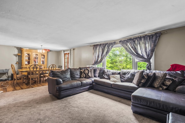 327 Steele St, New Britain, CT 06052 - carpeted living area with a chandelier and wood finished floors