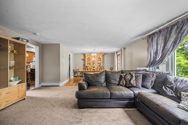 327 Steele St, New Britain, CT 06052 - carpeted living area with baseboard heating, a chandelier, and baseboards