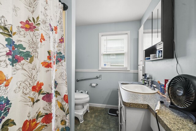 327 Steele St, New Britain, CT 06052 - bathroom featuring baseboards, vanity, toilet, and a shower with curtain