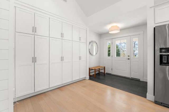 27 Quarry Rd, Stonington, CT 06355 - foyer entrance featuring lofted ceiling and wood finished floors