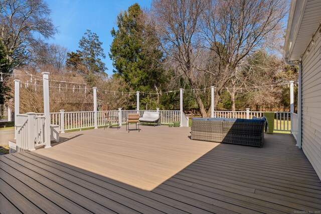 27 Quarry Rd, Stonington, CT 06355 - wooden deck with an outdoor hangout area and view of scattered trees
