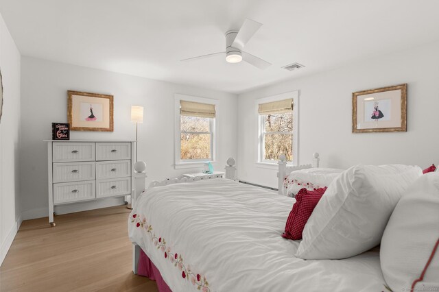27 Quarry Rd, Stonington, CT 06355 - bedroom with light wood-style flooring, a ceiling fan, and baseboards