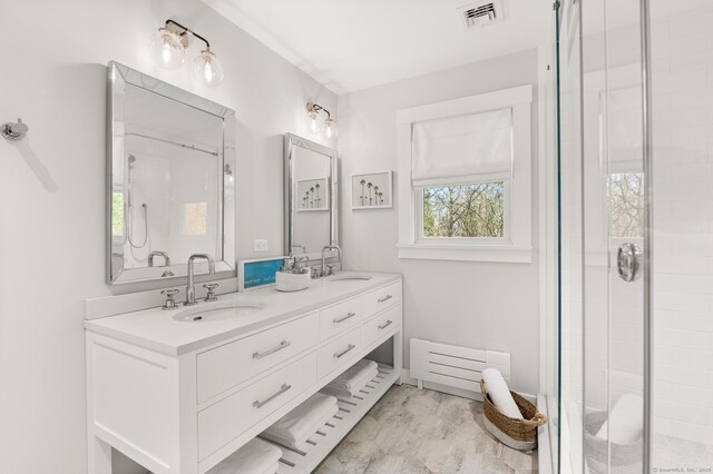 27 Quarry Rd, Stonington, CT 06355 - full bath featuring a stall shower, healthy amount of natural light, and double vanity
