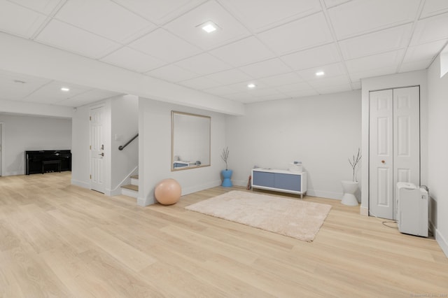 27 Quarry Rd, Stonington, CT 06355 - finished below grade area featuring stairway, wood finished floors, recessed lighting, baseboards, and a paneled ceiling